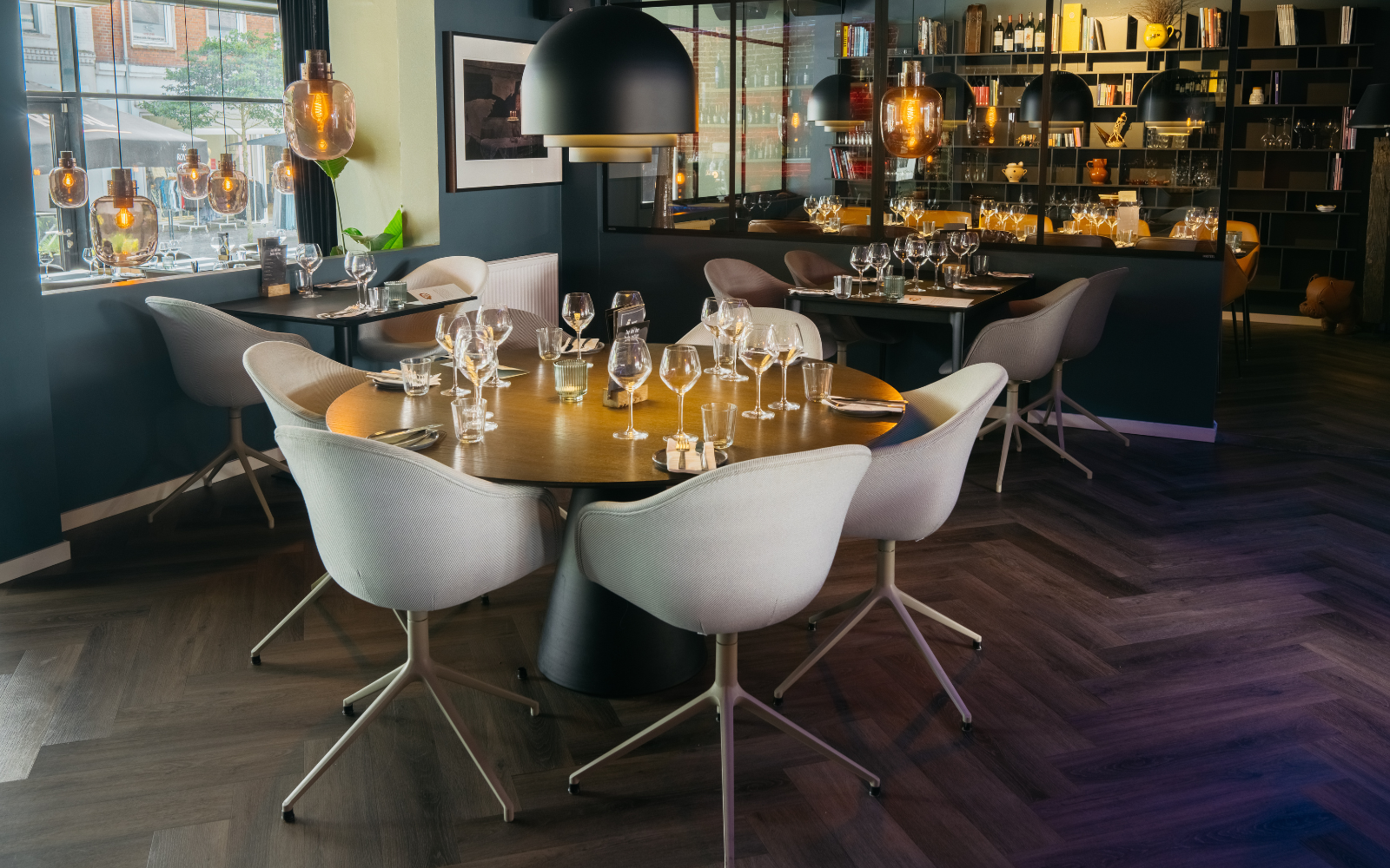 Tap Del Bar project, featuring the BoConcept Madrid dining table with gold finish top