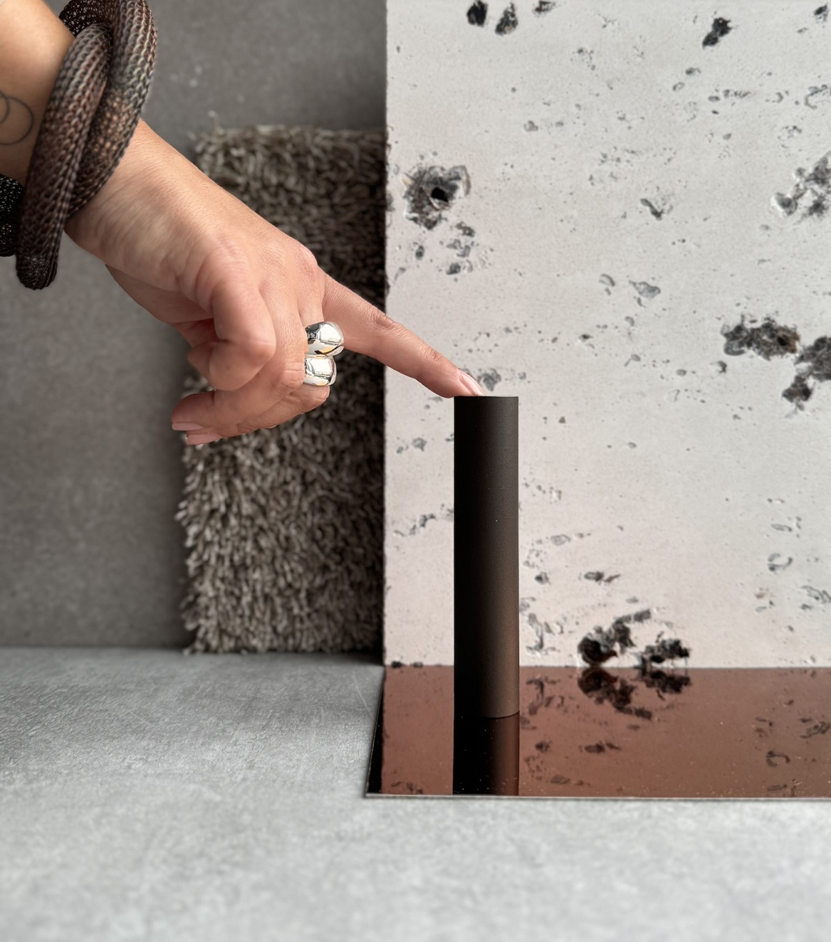 hand touching materials in LOM studio