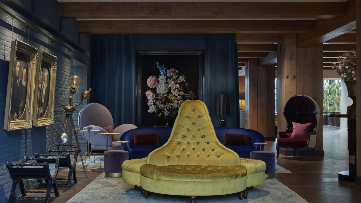 yellow couch in lobby at Pulitzer amsterdam