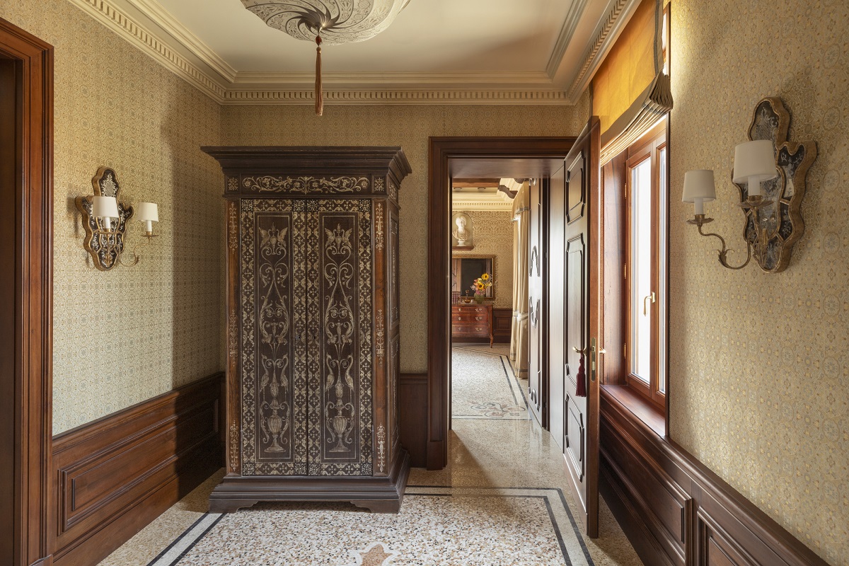 antique venetian wardrobe in hotel guestroom in Venice