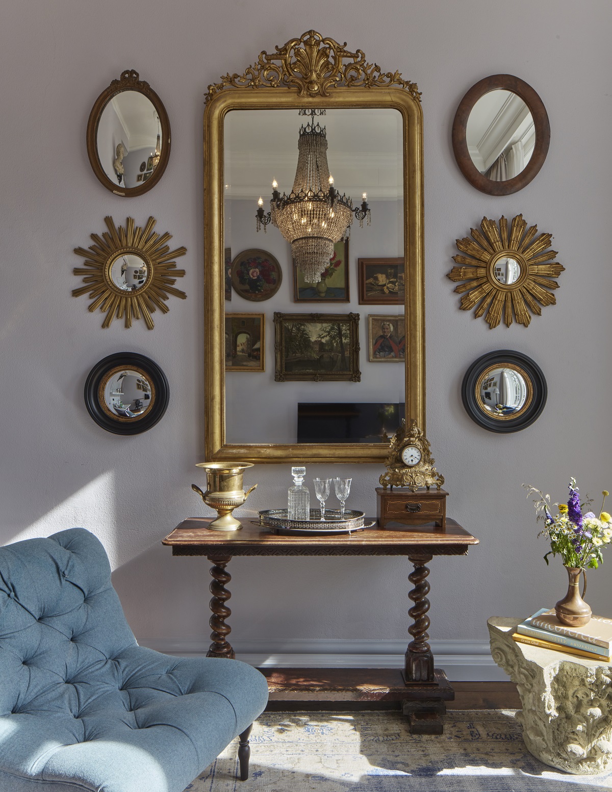 gallery wall in Porcelain Collectors suite with collection of mirrors