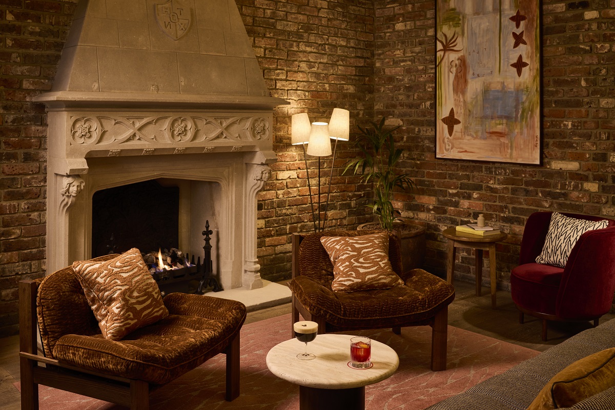 fireplace and seating in the lobby of The Hoxton Shoreditch