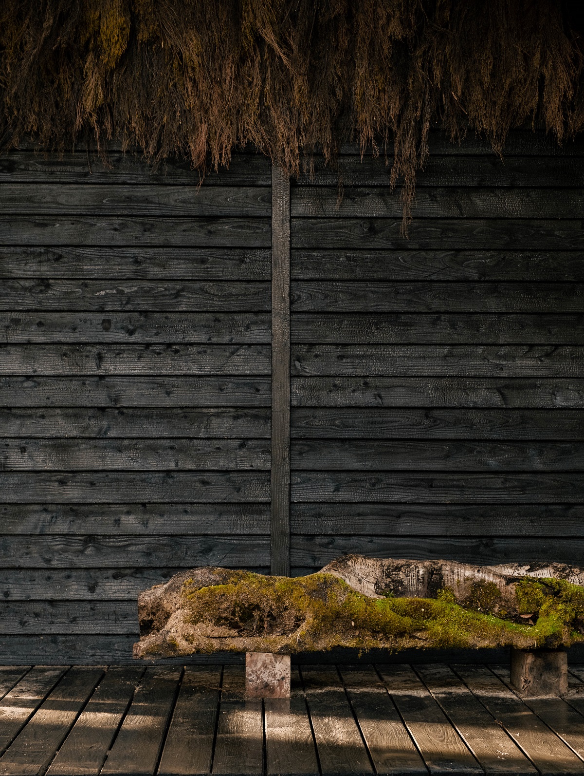 wood panelled cabin and wooden bench detail Architects Holiday cabins