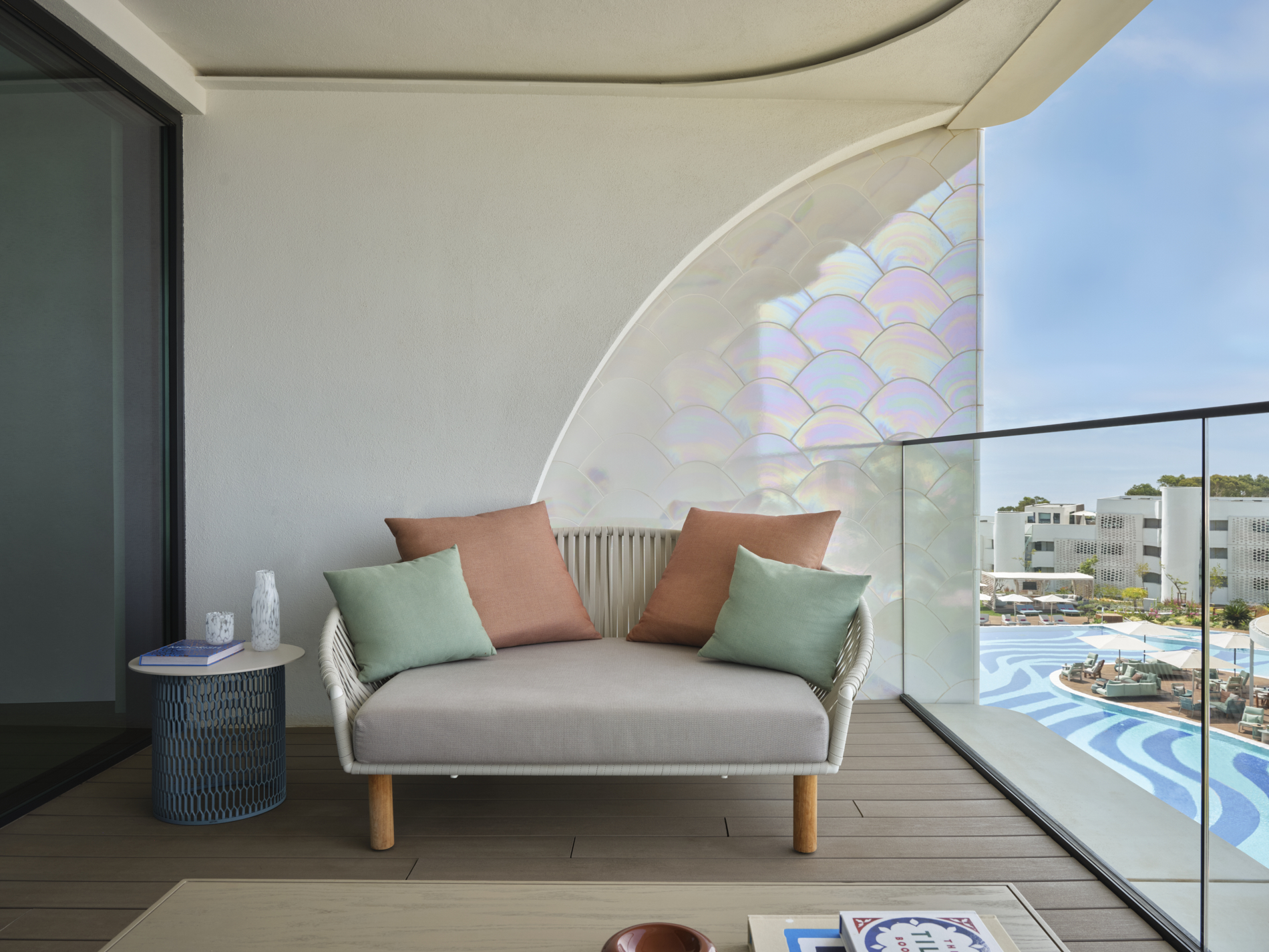 balcony with mermaid tail style glass work