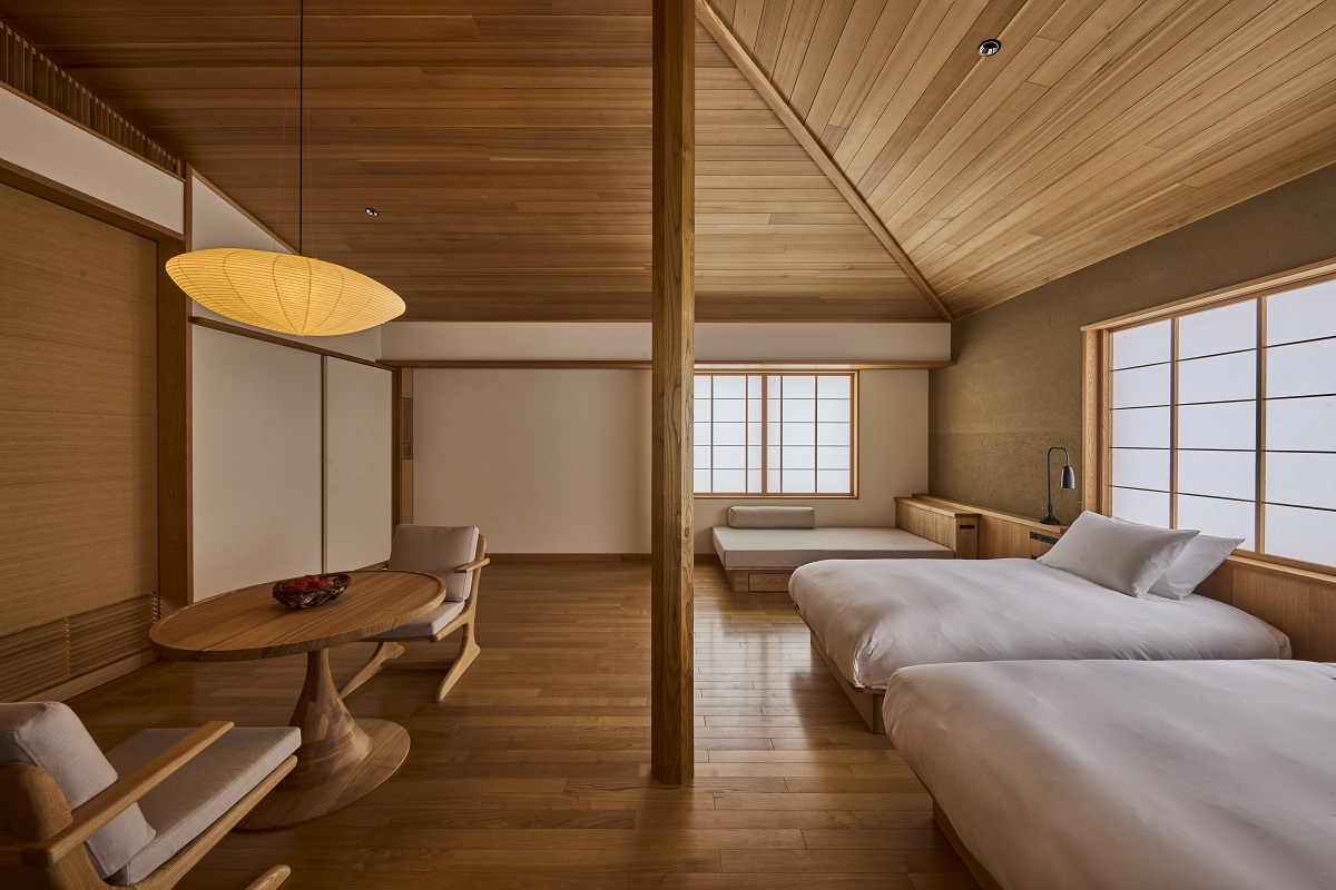 zen and minimalist guestroom in azumi forest villa with white cotton and natural wood