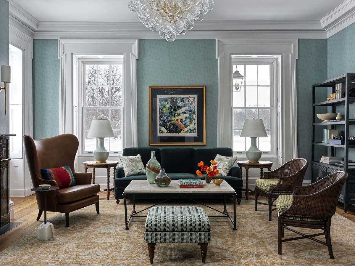seating in the farmhouse designed by Hart Howerton with period furniture and contemporary lighting