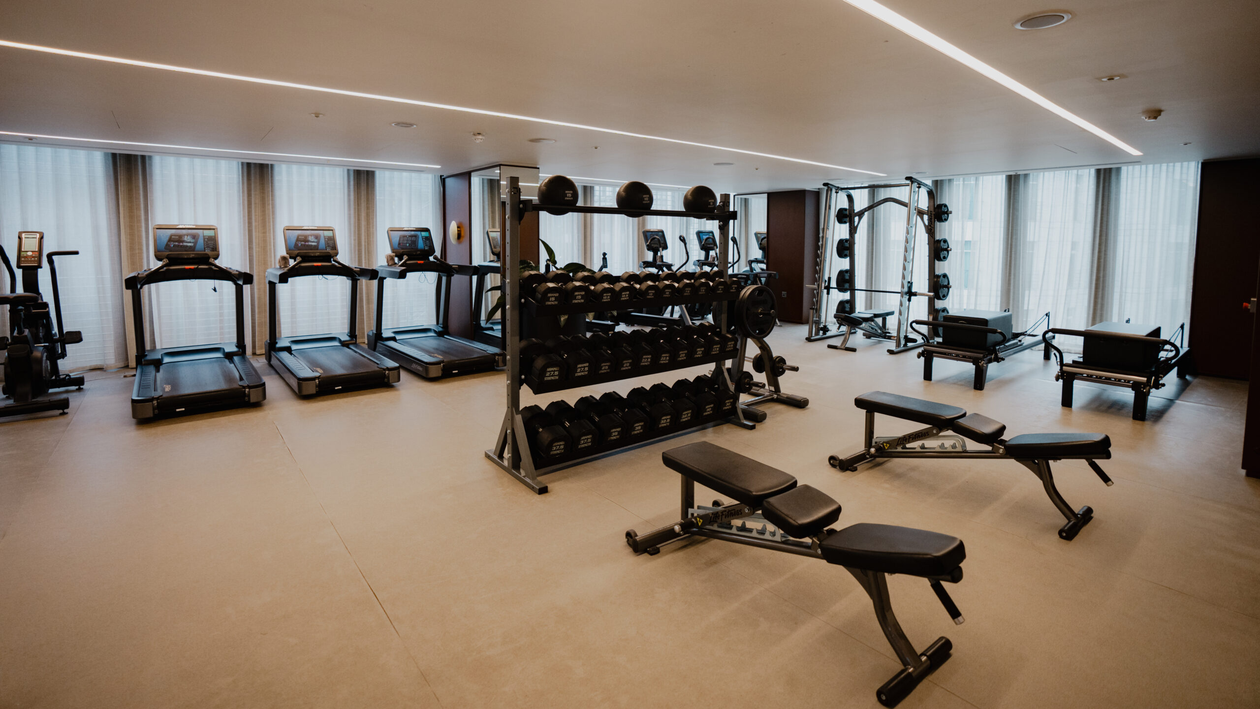 Gym equipment in hotel space from Life fitness