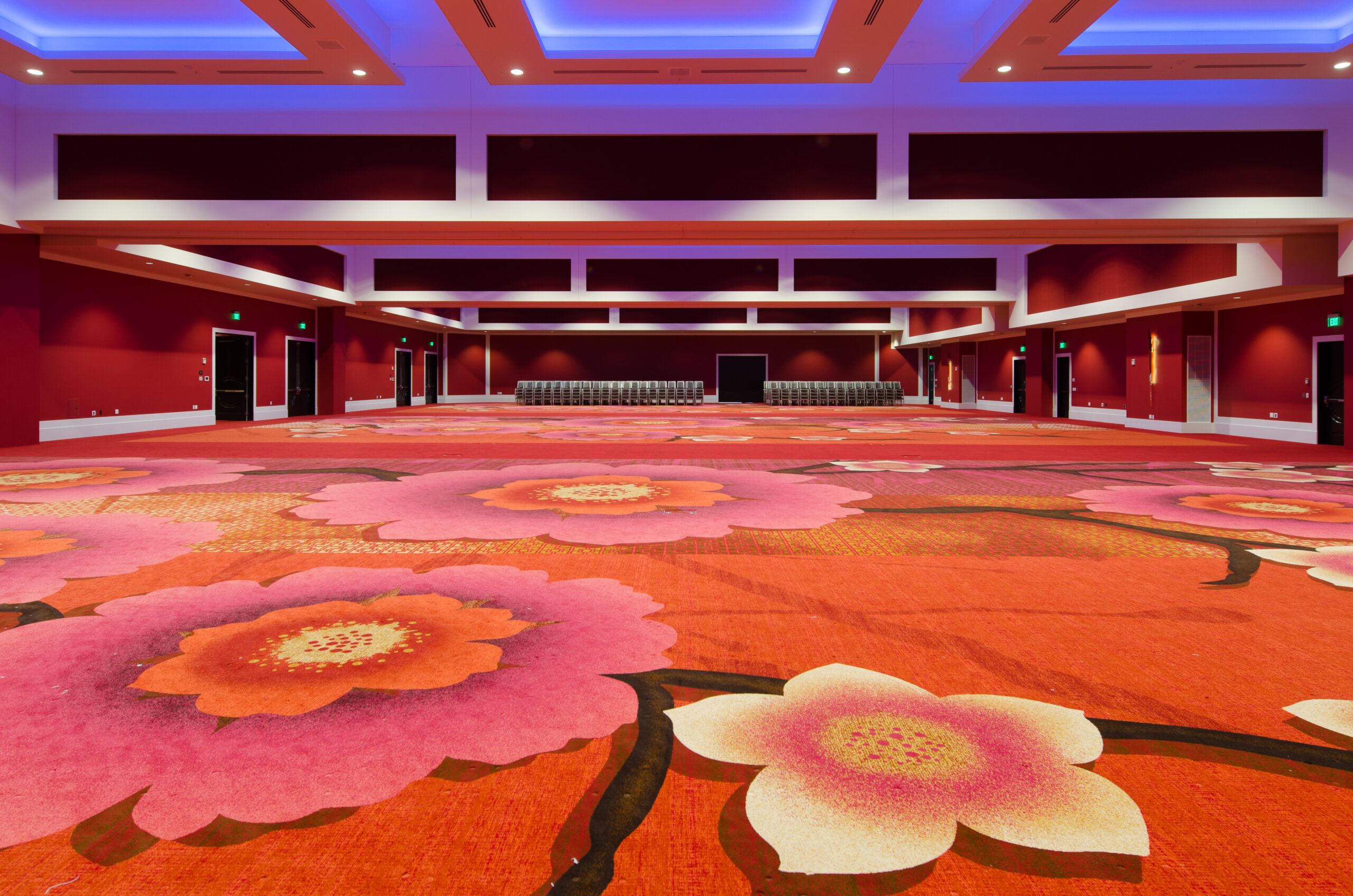 Pink and orange floral patterned carpet by Brintons at Davenport Grand Hotel