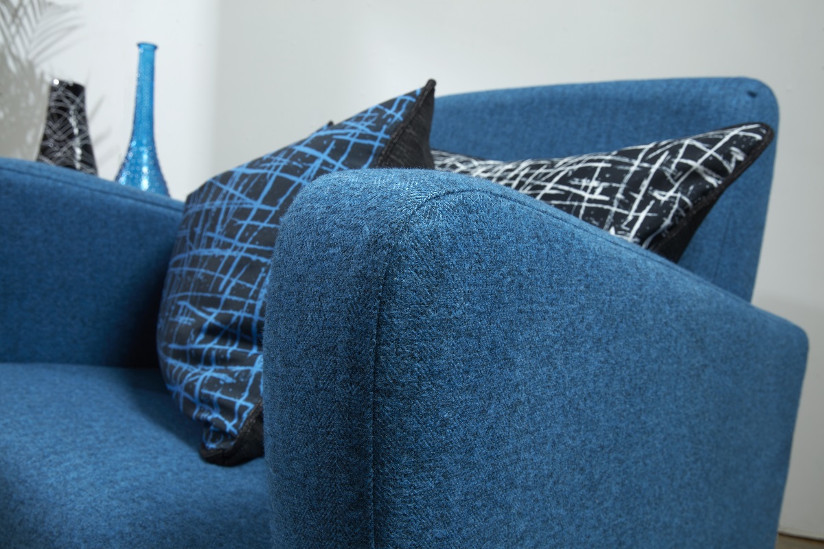 edge of chair showing detail of upholstery fabric