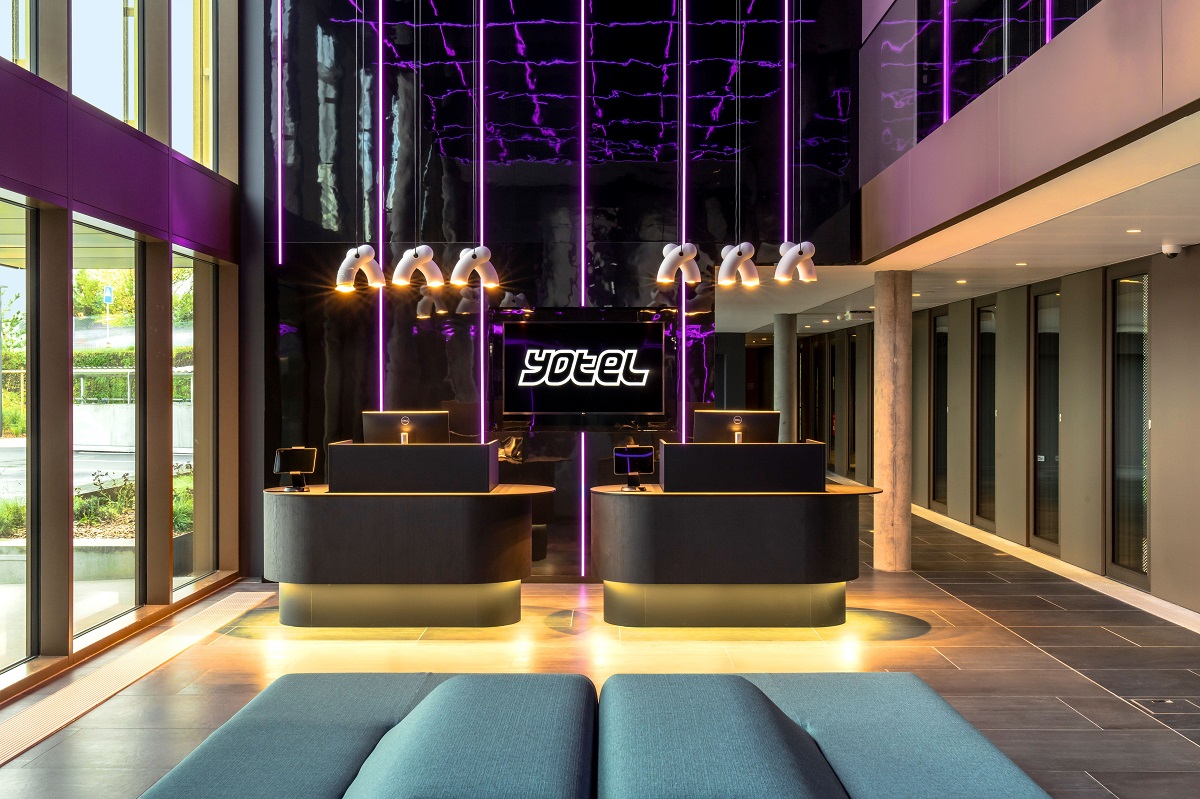 yotel lobby and reception with branding