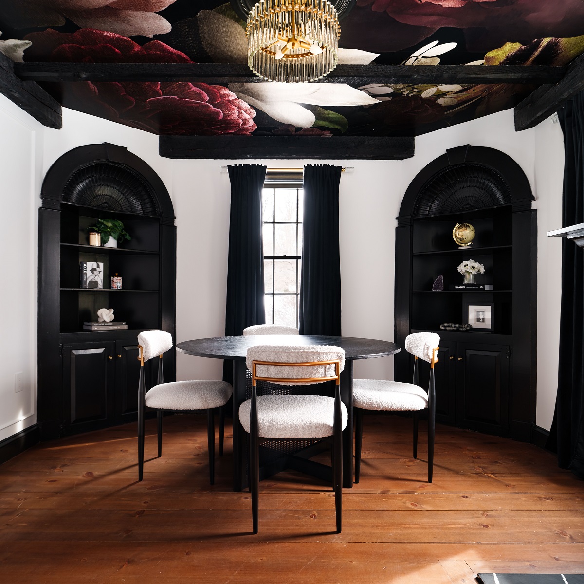 oversized floral print on ceiling with dark wood detailing below
