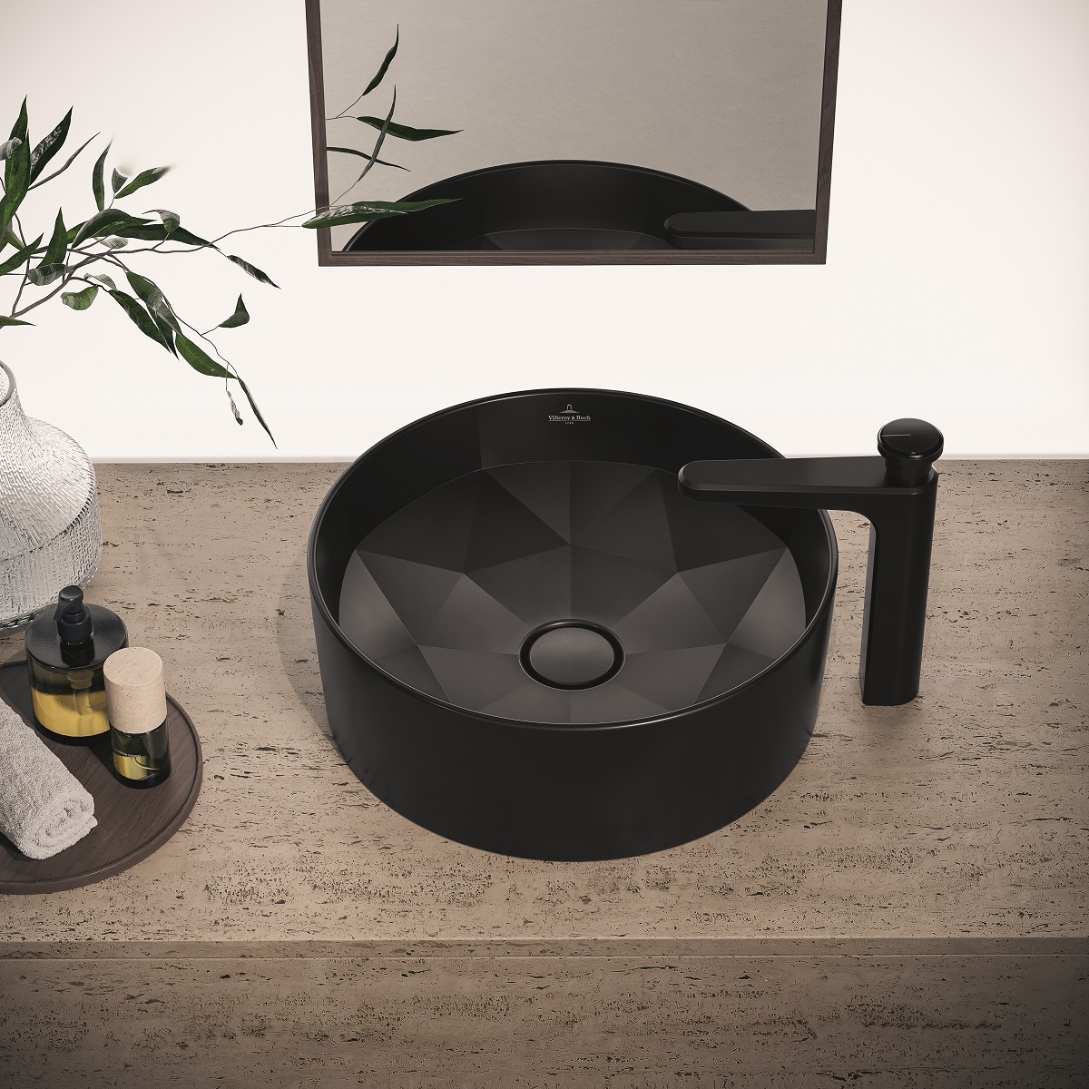 Octagon from Villeroy & Boch - a black round basin with faceted interior