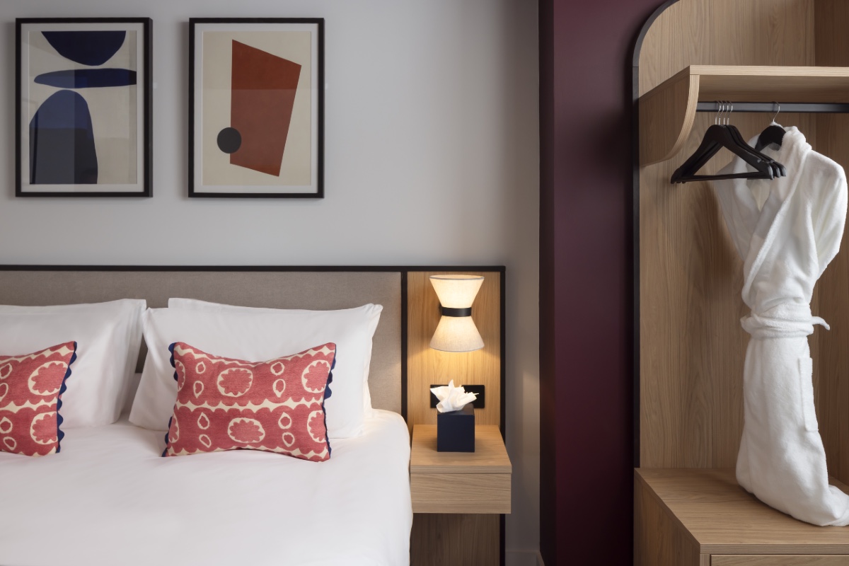 bed detail, wardrobe and dressing gown in onefifty fenchurch