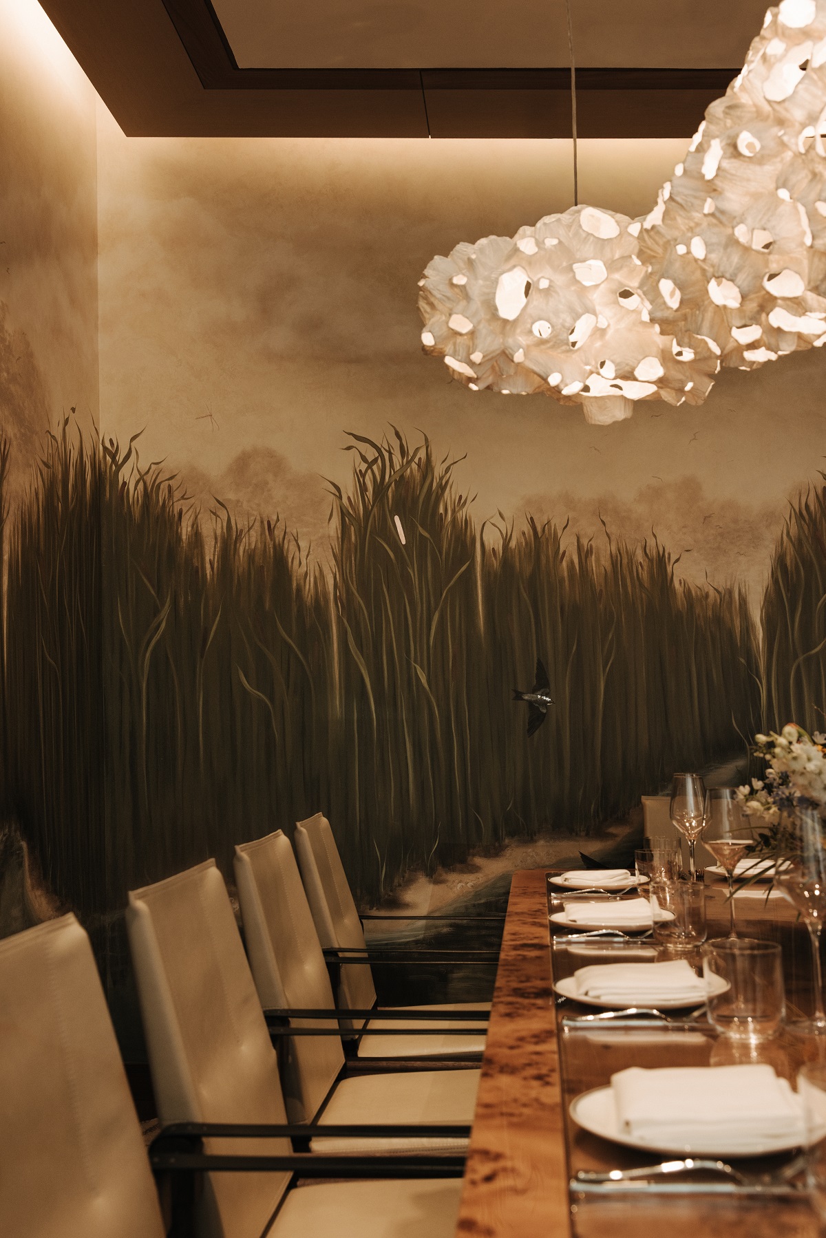 the private dining room in The Crossing wth an immersive custom mural created by Lonesome Pictopia.