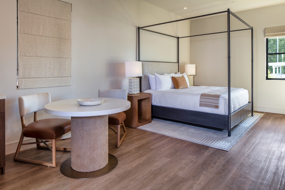 minimalist four poster bed in guestroom 