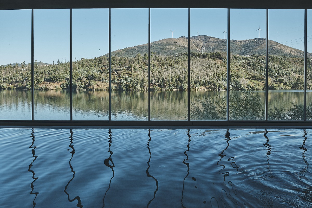 indoor pool at Octant Douro with view out to the river 