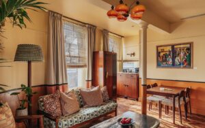 couch, lamp and home-style furniture in Portobello Lodgings