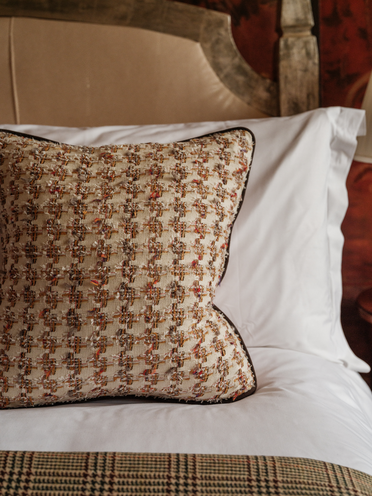 coco chanel inspired tweed cushion on bed