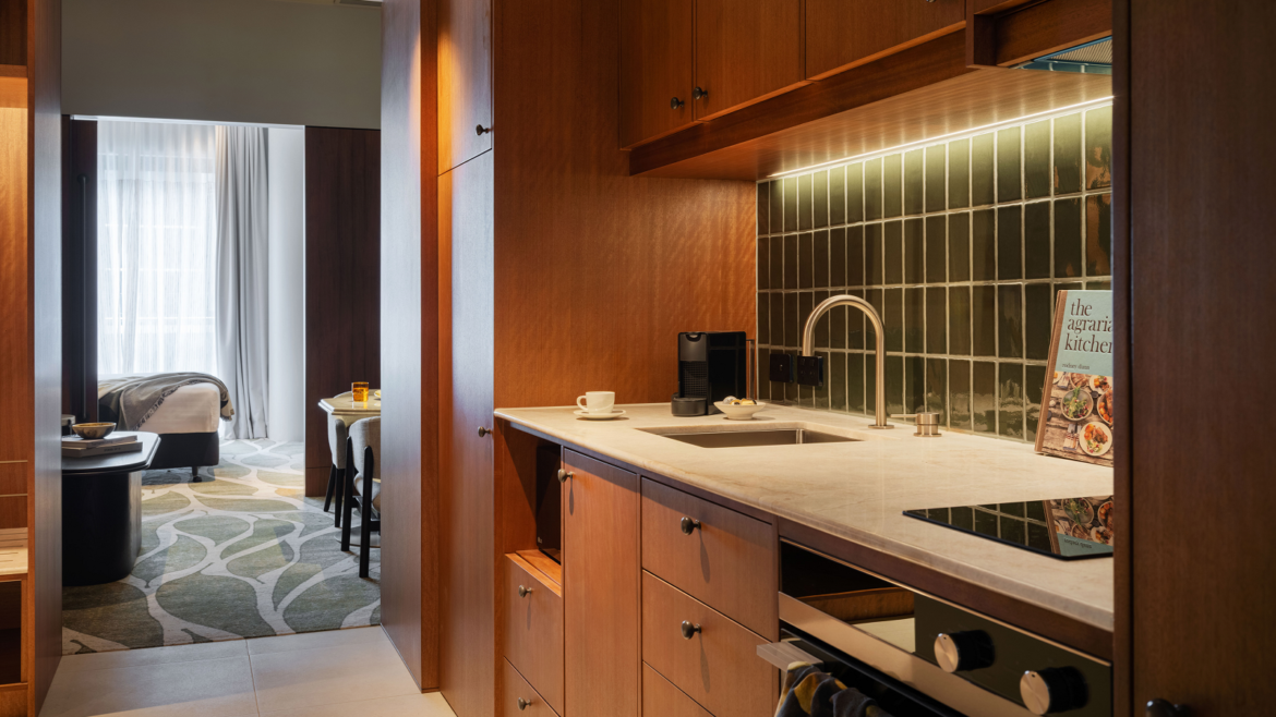view from kitchen into guestroom at Adina Hobart
