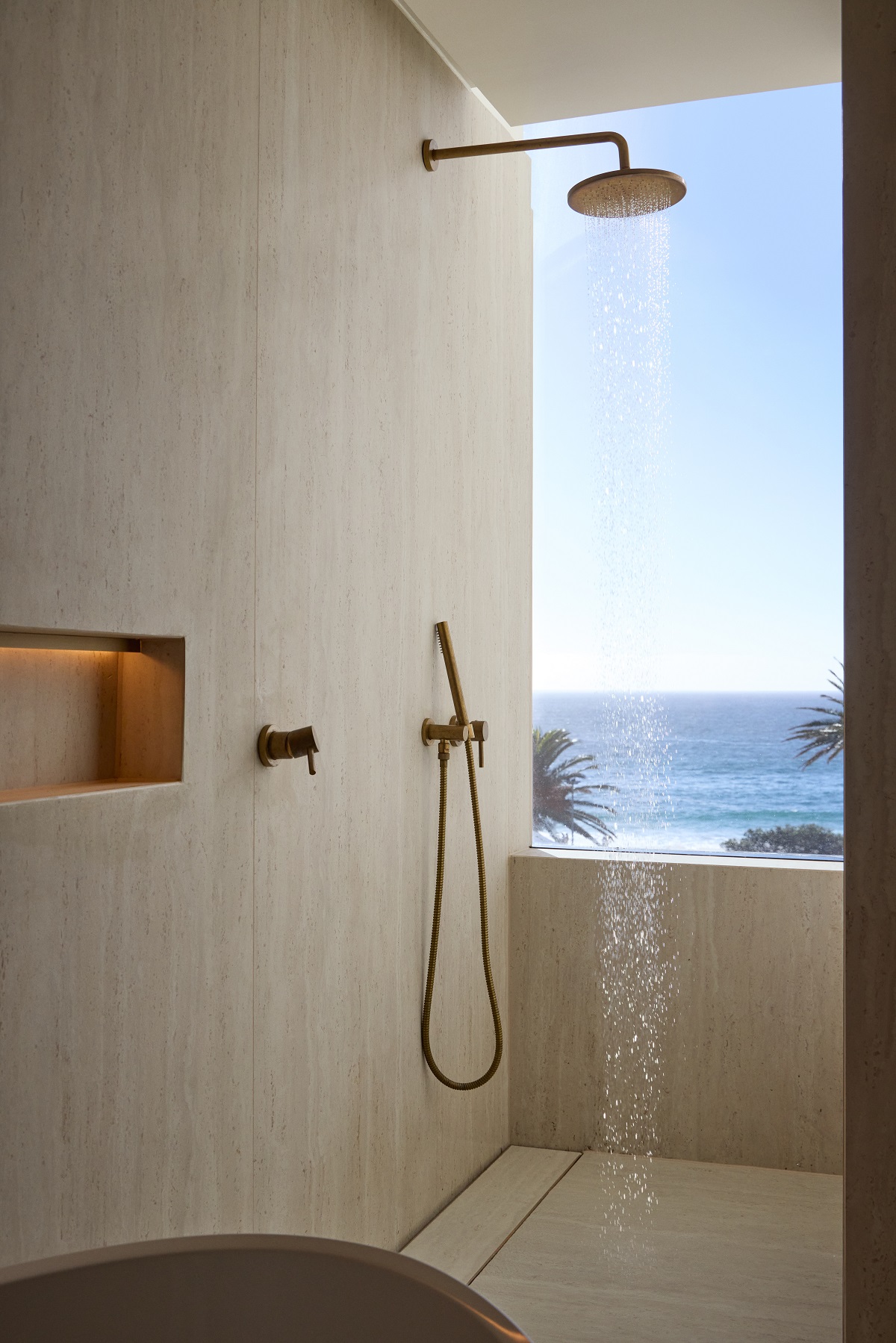shower in Morea House with view of camps bay beach