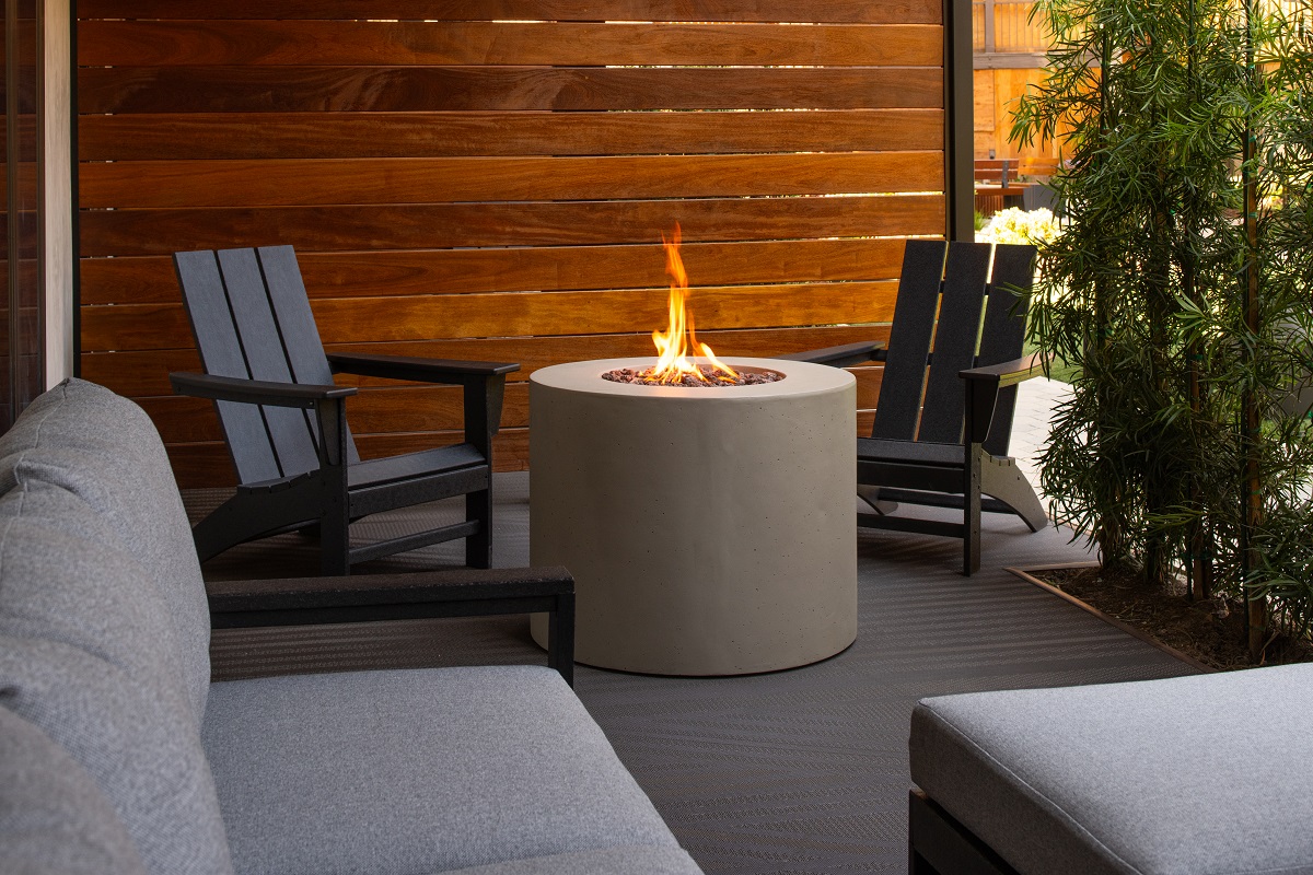 chairs and firepit on guestroom patio