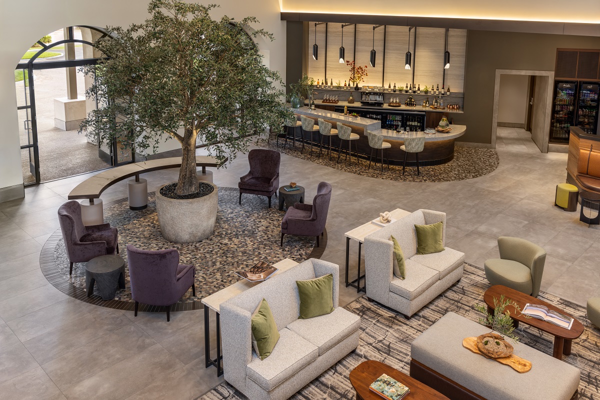 seen from above - high volume ceiling in lobby of Casa Mani with tree in centre