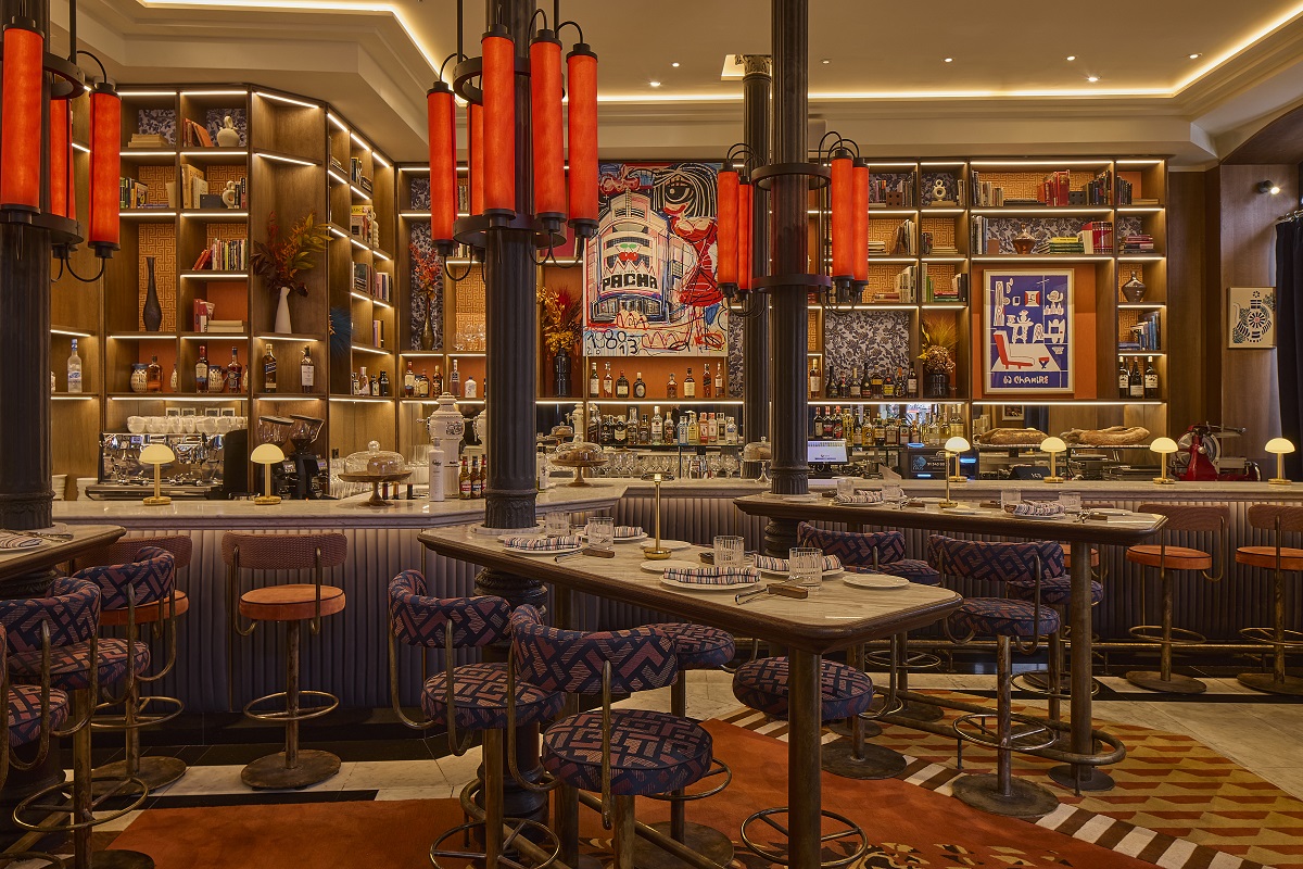 library bar with red lights and art on the wall in KeliRestaurant-Madrid_