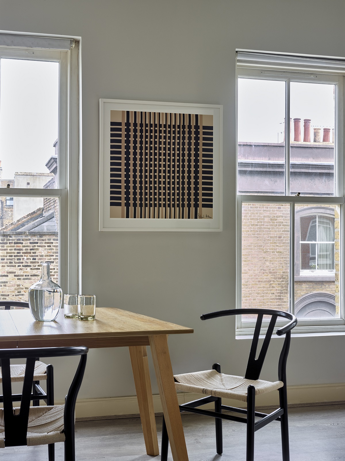 framed Richard Allan print Manhattan on the wall in contemporary London apartment