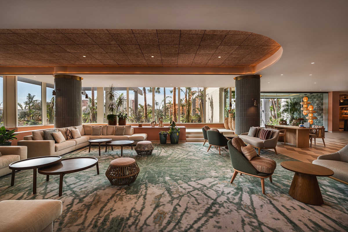 bar and seating area in hotel with view out to garden 