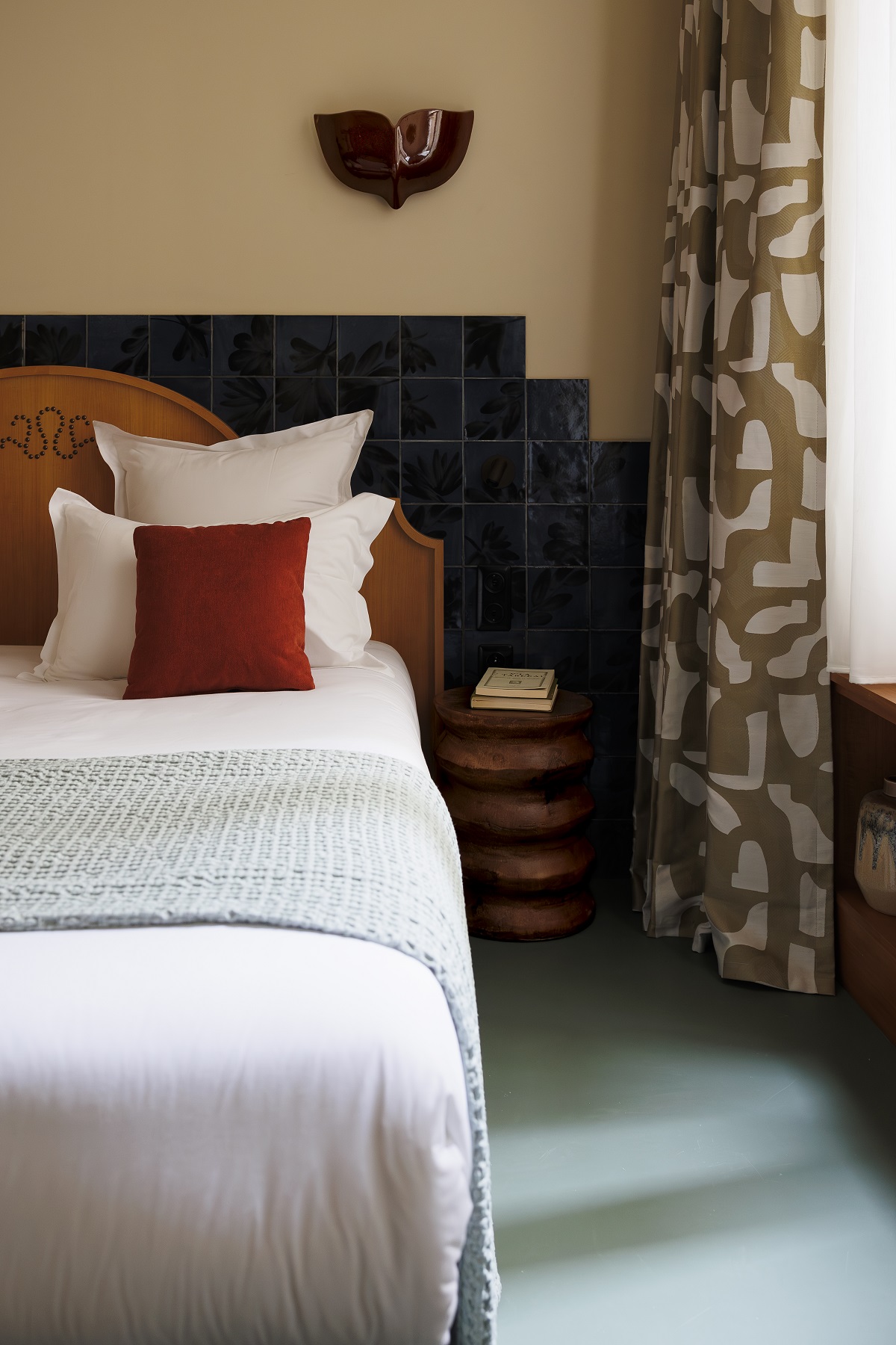 babel lille with bespoke tiles as headboard