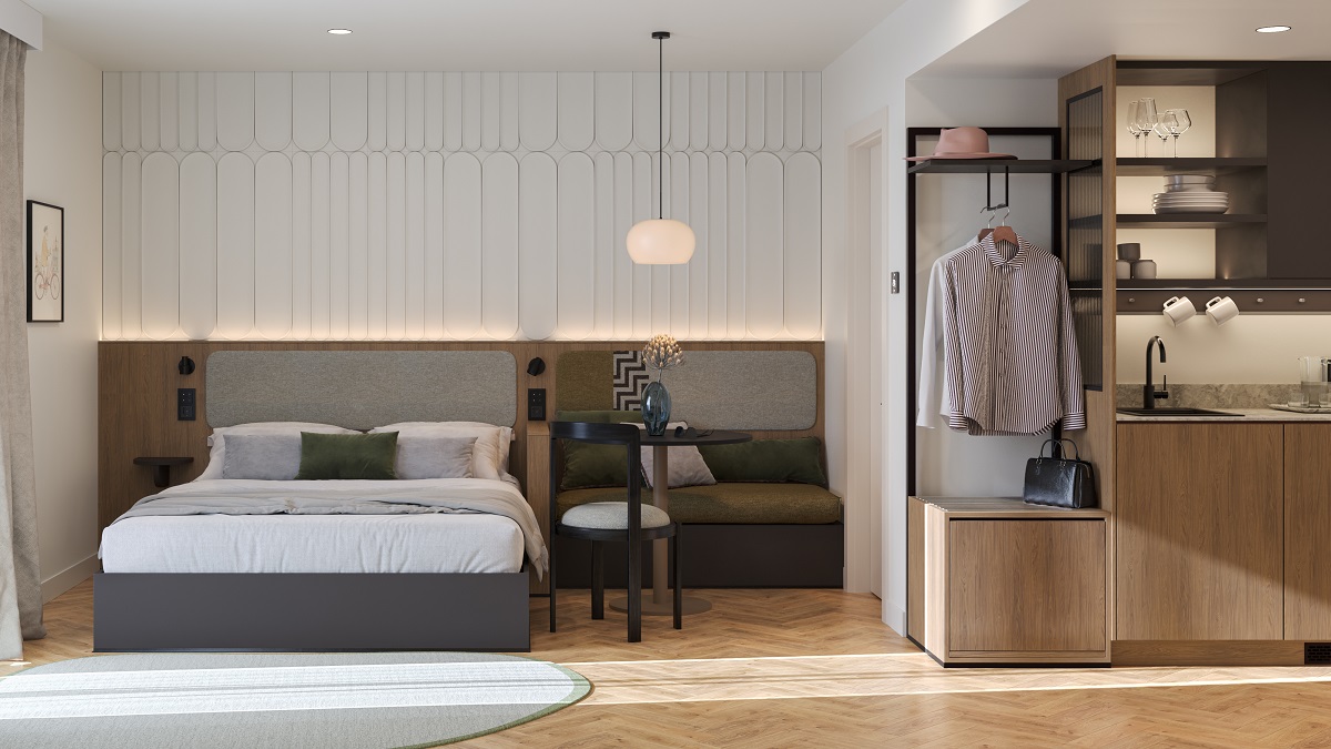 white and grey guestroom with white panelling above the bed in BobWStuttgart