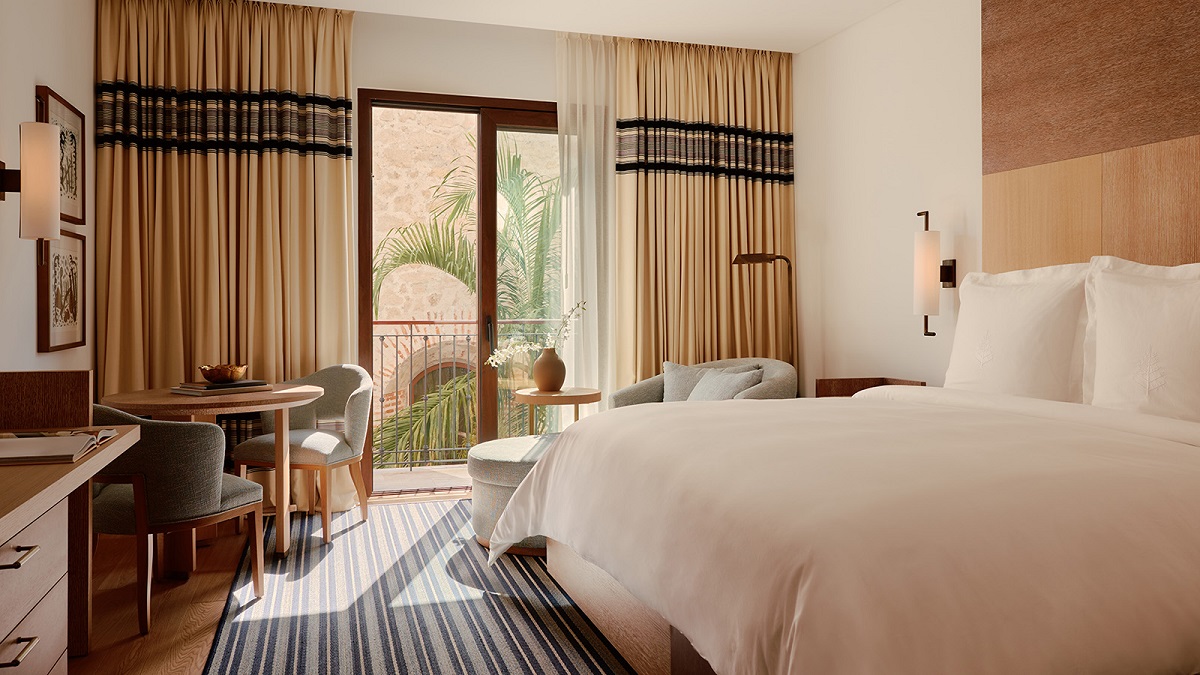 cream and white hotel guestroom