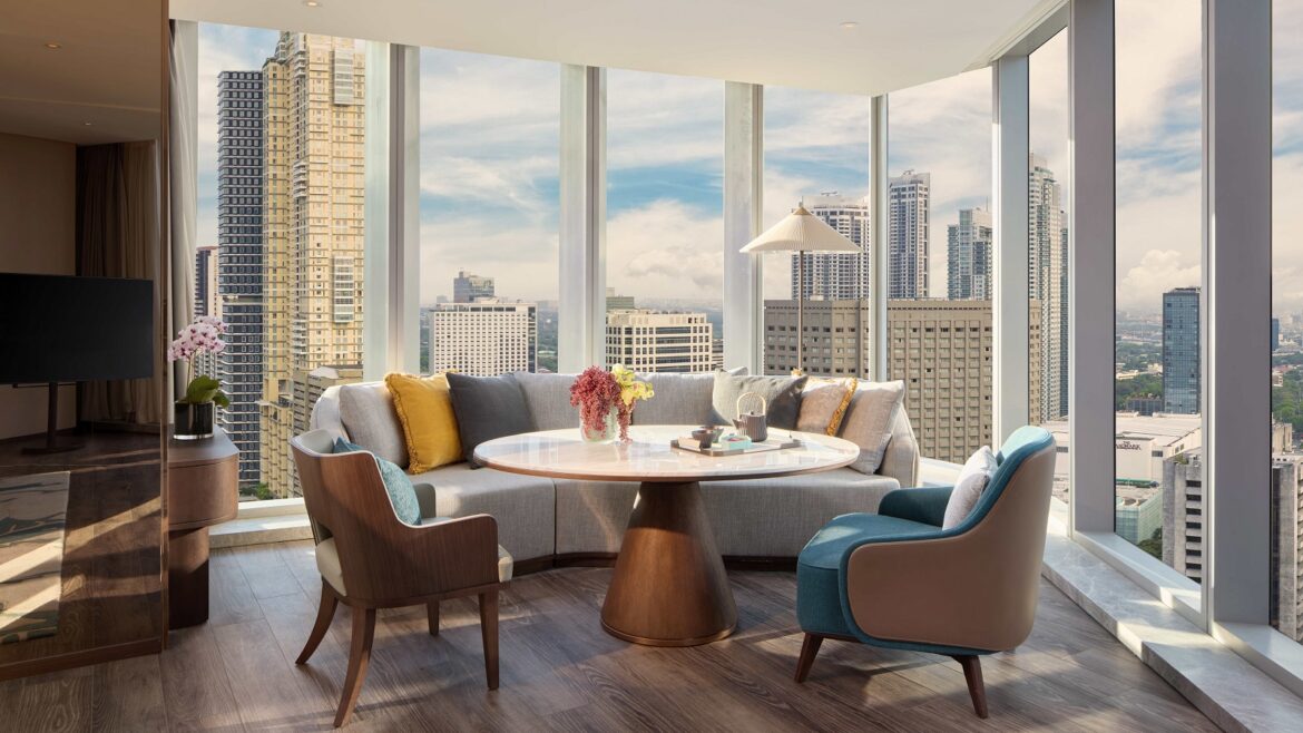 Manila city skyline from the Junior Suite Living and Dining area at Mandari
