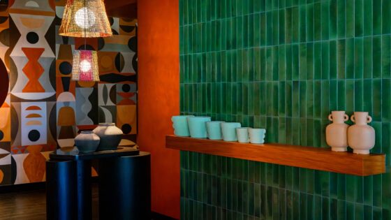green tiled wall - orange pillar - painted mural in Salted Egg Darwin