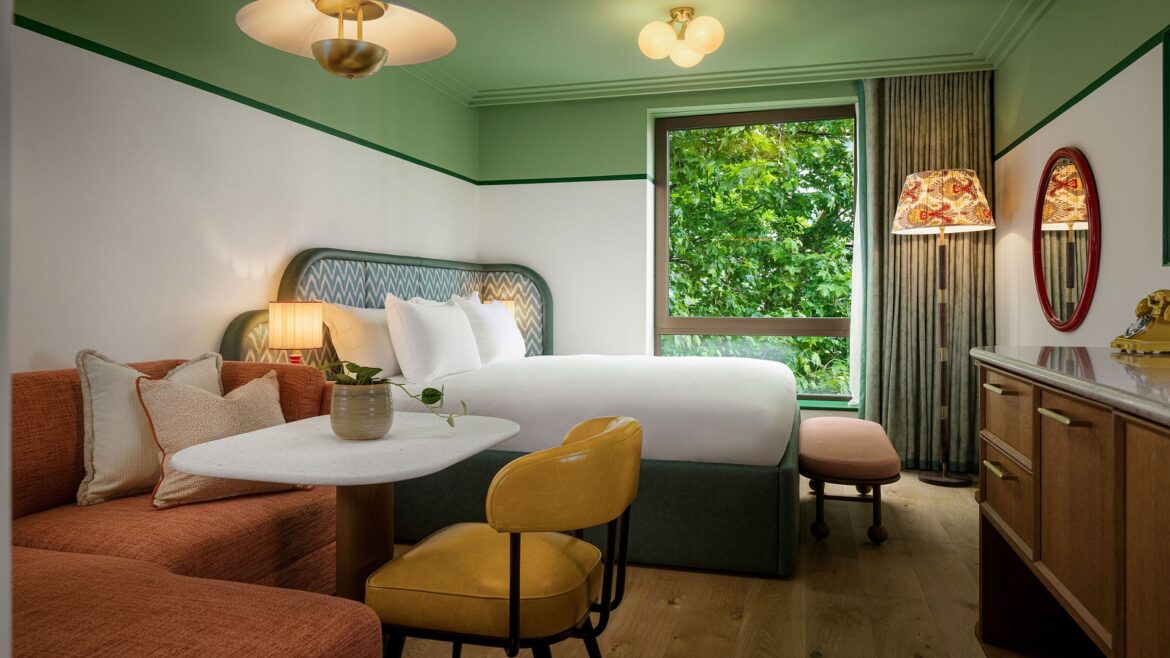 green ceiling and white wall and green headboard in the July with hypnos mattress