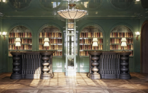 lobby with bookshelves behind reception desks and centred feature light in Fairmont Cheshire, The Mere