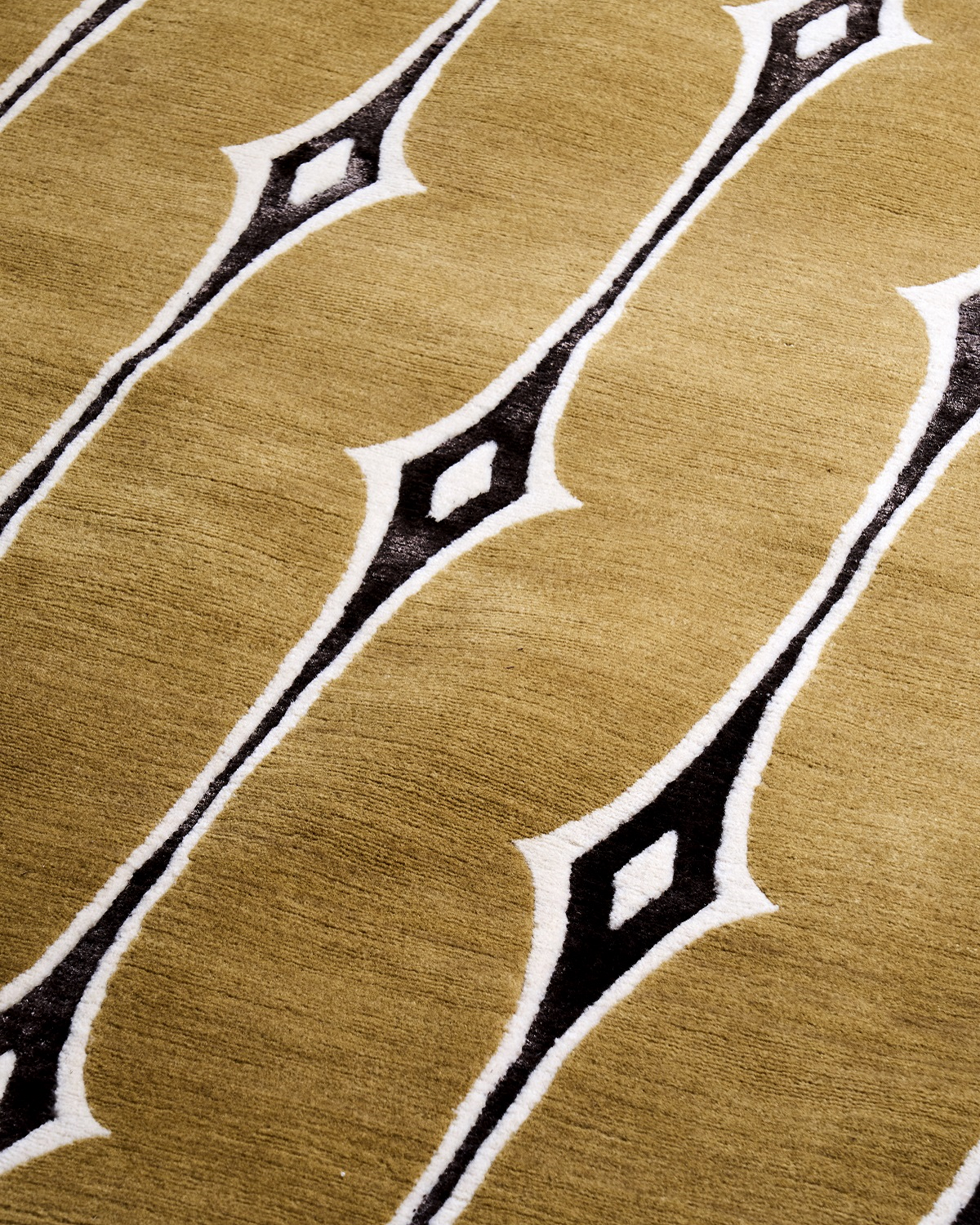 Sedra, from our Talis collection, takes a different approach. One of our most immersive Art Deco designs