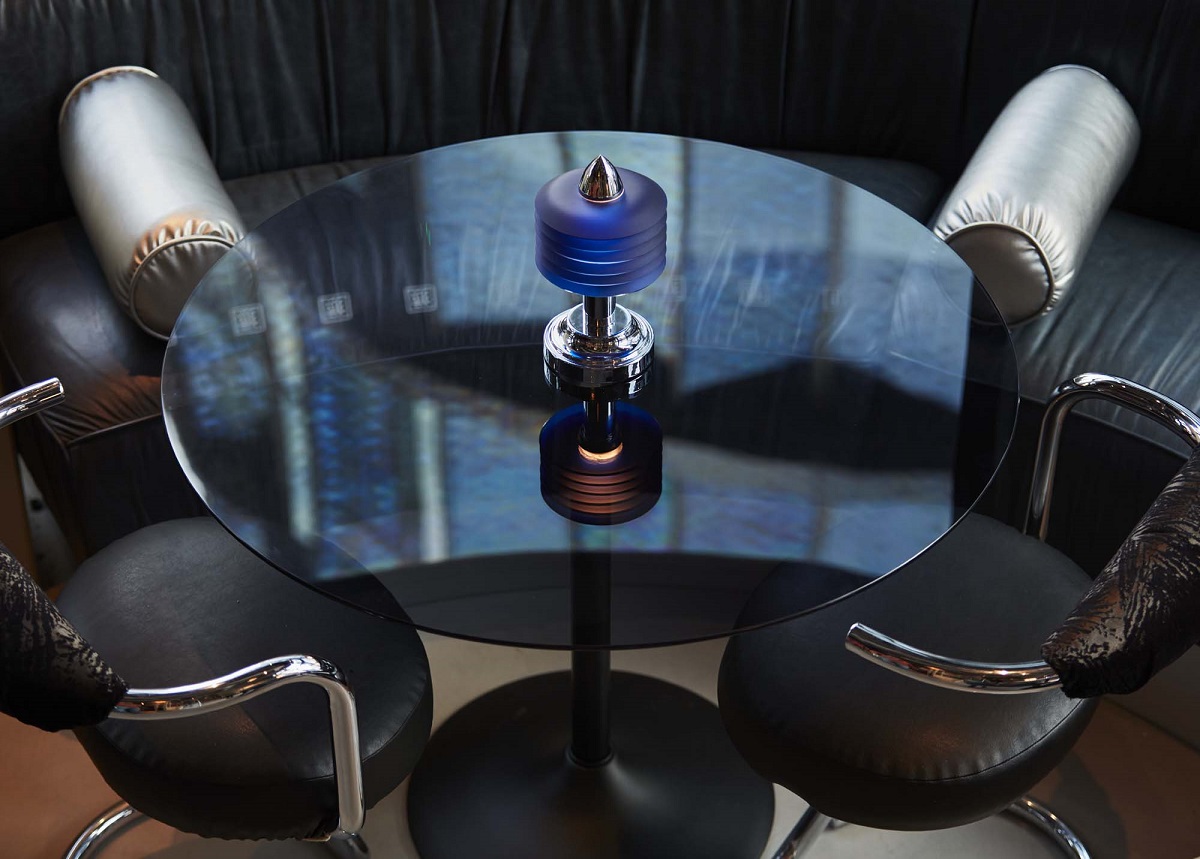 dark blue round table and booth designed by Run for the Hills for Wolves of Tokyo