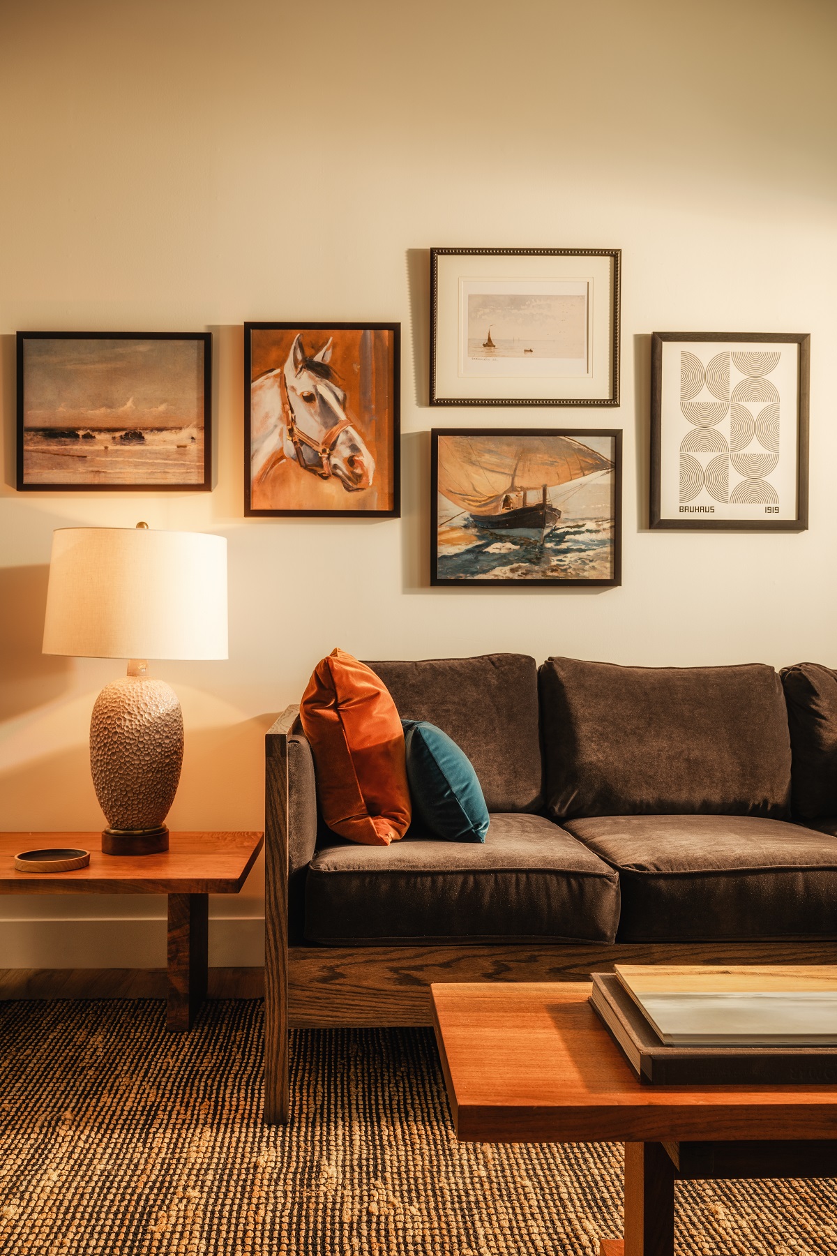 comfortable seating, art on the walls and wooden surfaces in the public areas
