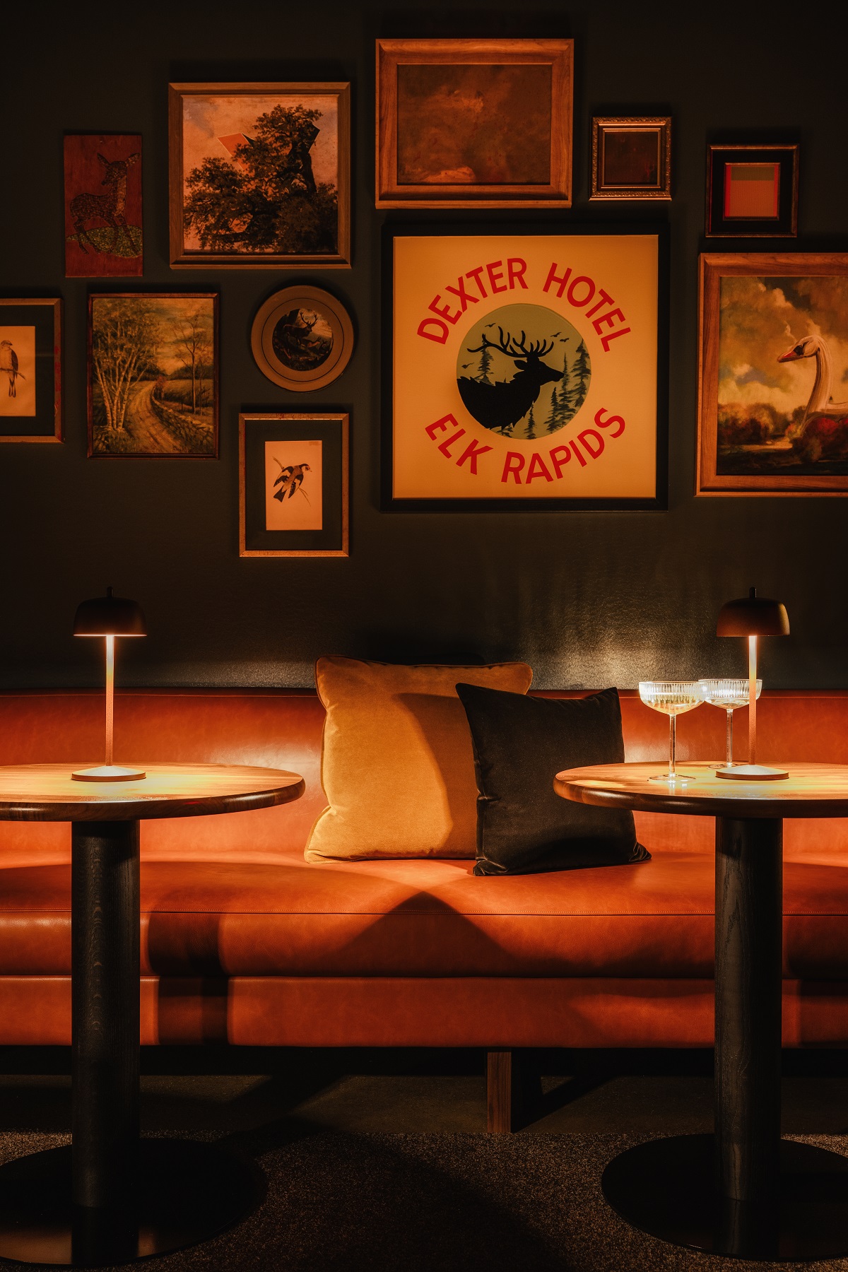 banquette and art gallery wall in The Dexter bar
