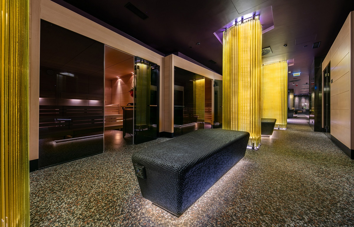 The glass panels establish the rhythm of the space and change character depending on the natural and artificial lighting.Project: Wellness Vitality Hotel Punta, Mali Lošinj, Croatia,