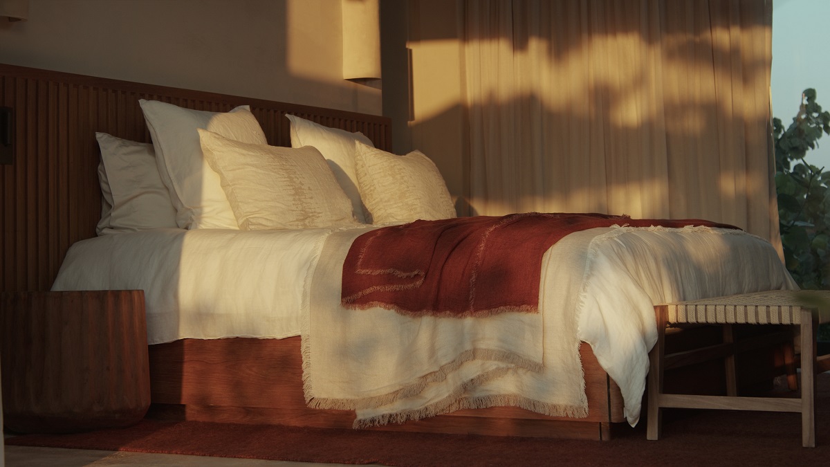 light and shadows on natural colours of the bed and curtains