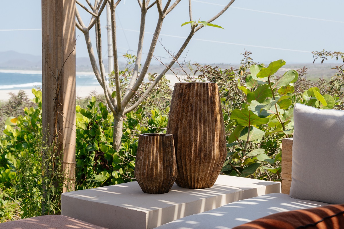 hand made pots , wood and clay in the design details