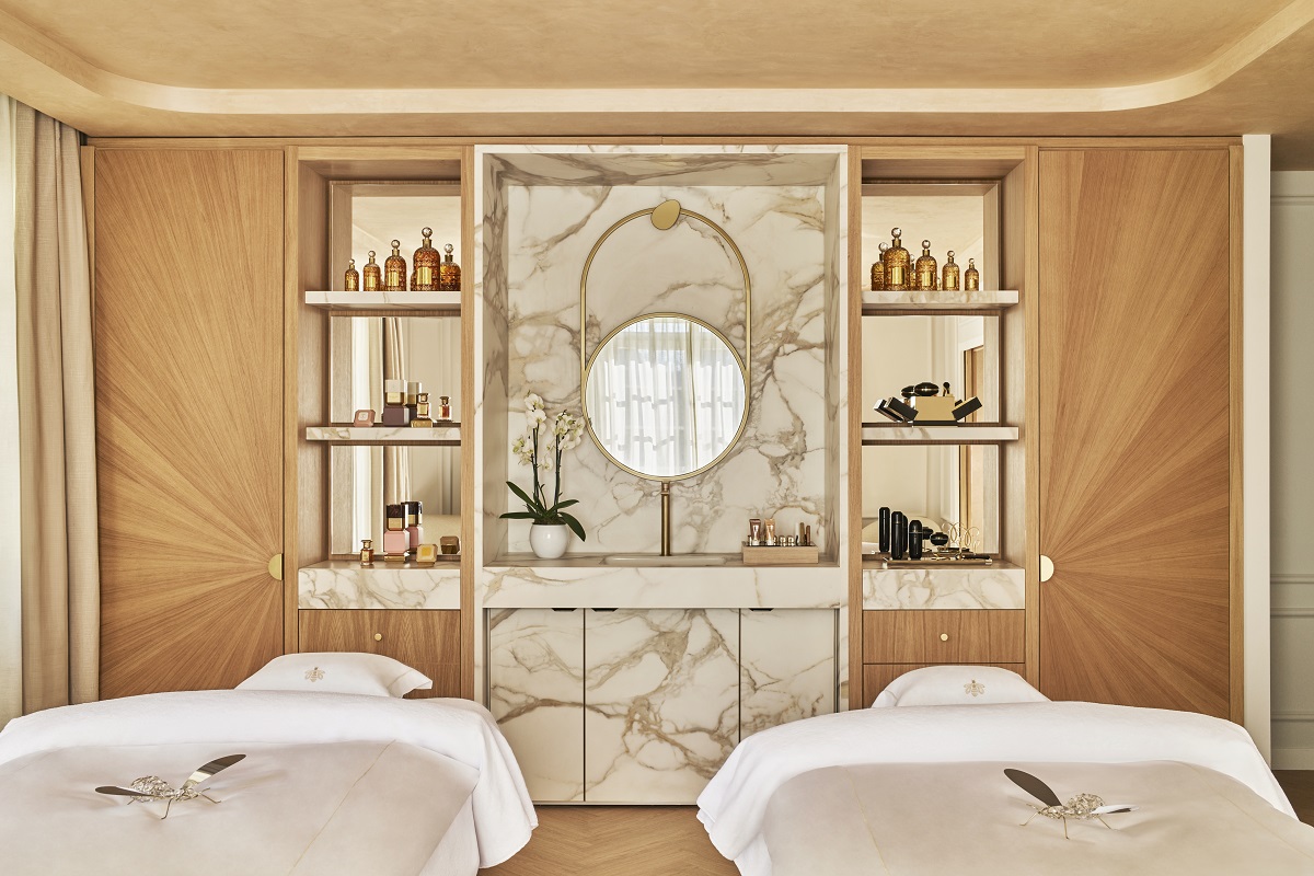treatment beds and marble shelving in The Guerlain Spa Normandy