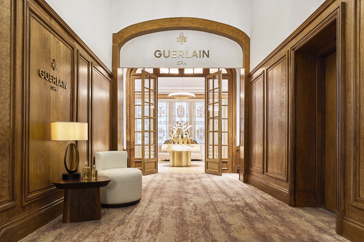 wood panelling and glass doors at entrance to guerlain spa Hotel Barrière Le Normandy