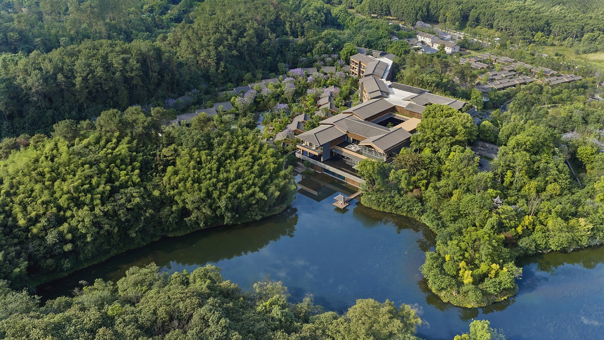 aerial view - Nestled in the foothills of Mount Emei (also known as Emeishan), the resort serves as a gateway to the Mount Emei Scenic Area, part of a UNESCO World Heritage Site 