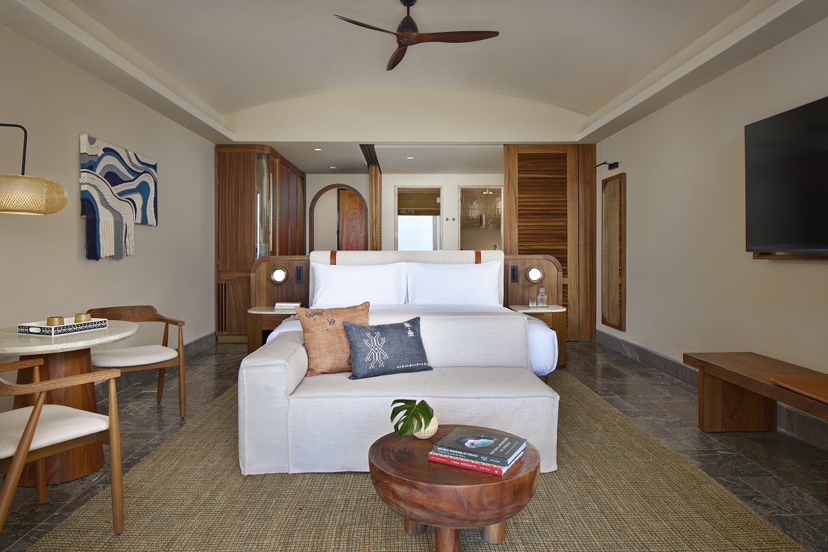 seating in front of bed in hotel suite