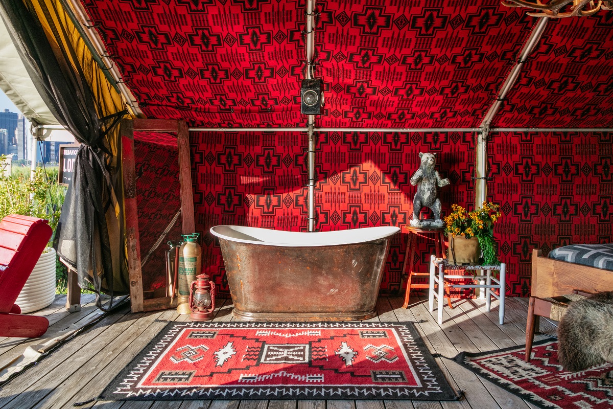copper freestanding bath in glamping tent