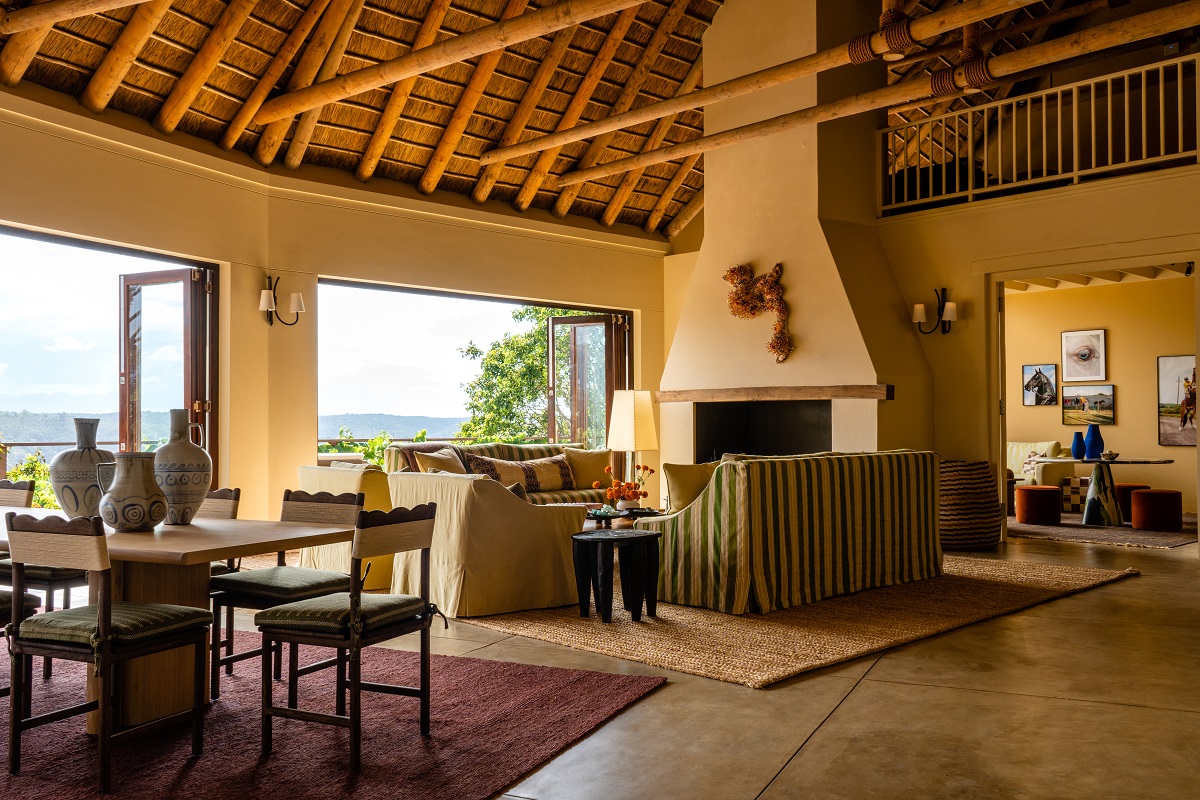 open plan and open air living spave under wooden beamed roof at Tamodi Estate South Africa