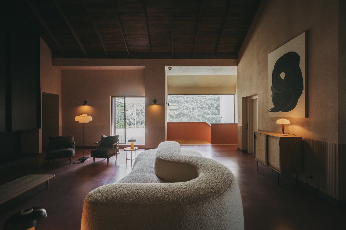 ceentral curved couch in hotel lobby design by Studio Astolfi